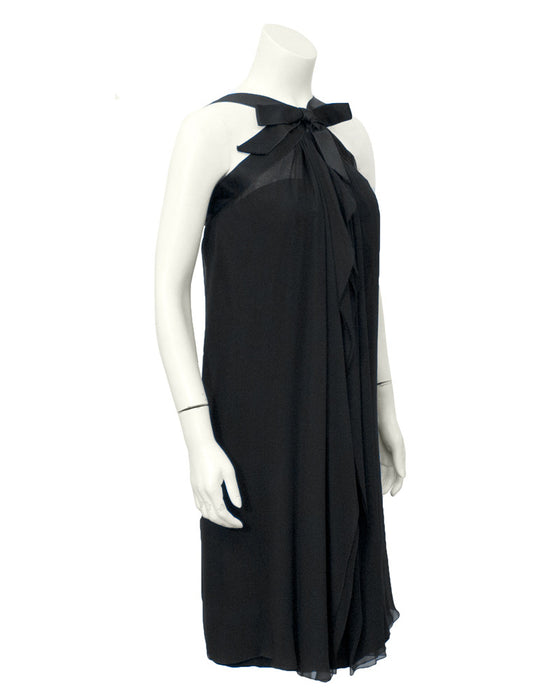 Black cocktail dress with bow
