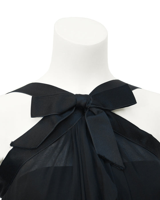 Black cocktail dress with bow