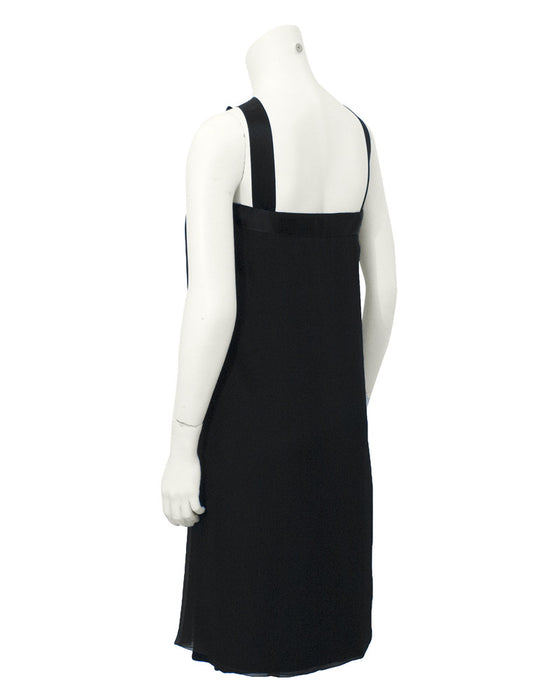 Black cocktail dress with bow