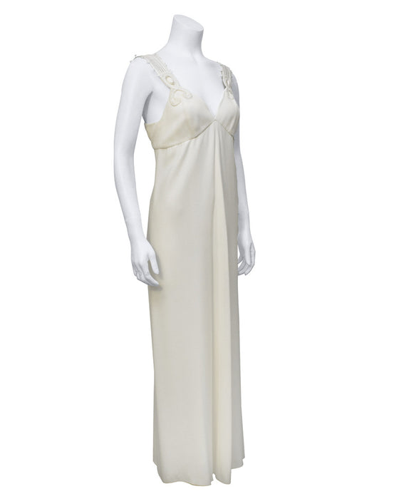White gown with cord and stone applique