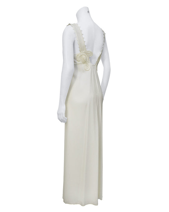 White gown with cord and stone applique