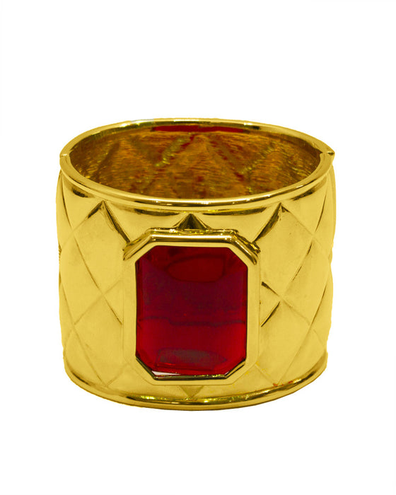 Gold quilted cuff with red poured glass stone