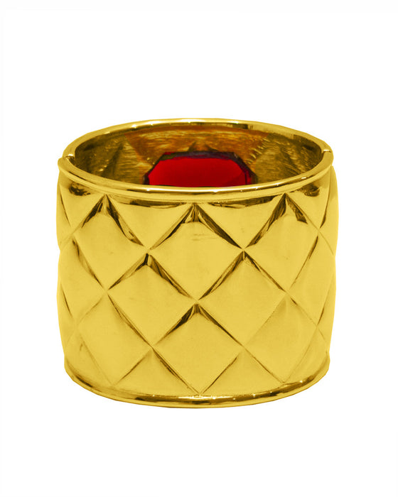 Gold quilted cuff with red poured glass stone